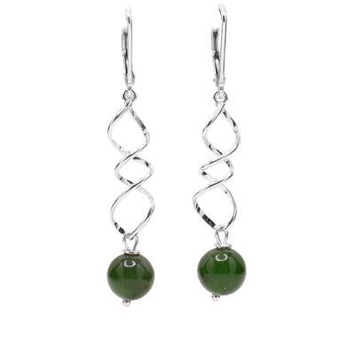 For each earring, sterling silver twists down to a round BC jade bead. Minimalist design. Lever back hooks.