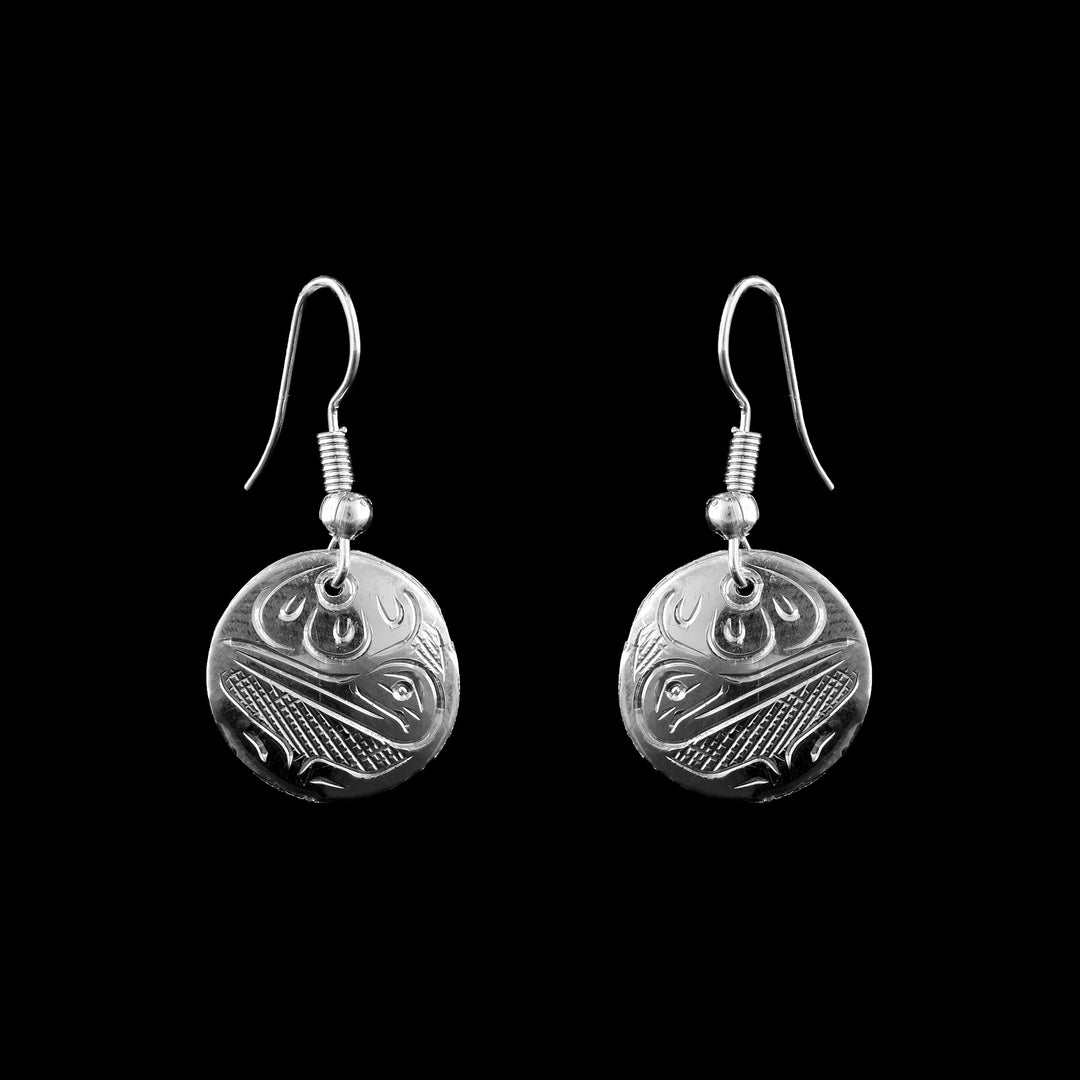 Discover the beauty of the hummingbird legend with these hand-carved sterling silver earrings. Authentic Coast Salish jewelry by Graham Henry in a classic round style.