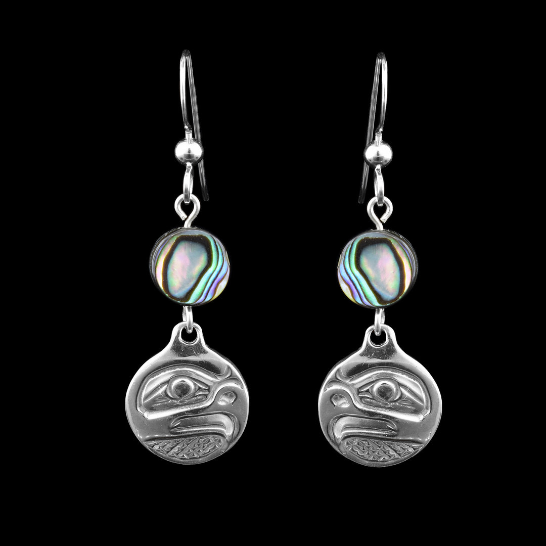 Eagle circular earrings with an accent of abalone shells on top of the silver tear. They dangle from French hooks.