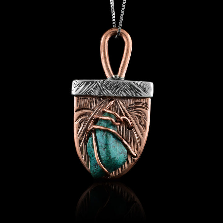 Hand-carved Sterling Silver, Copper, and Turquoise Hummingbird Pendant by Kwakwaka'wakw artist Cristiano Bruno. A shield-shaped Indigenous pendant.
