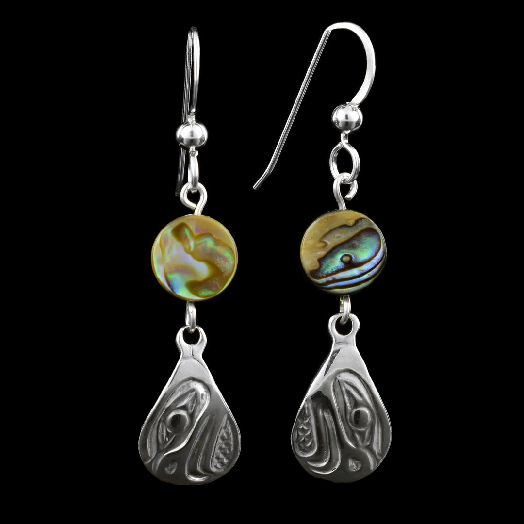 Eagle tear drop earrings with an accent of abalone shells on top of the silver tear. They dangle from French hooks.