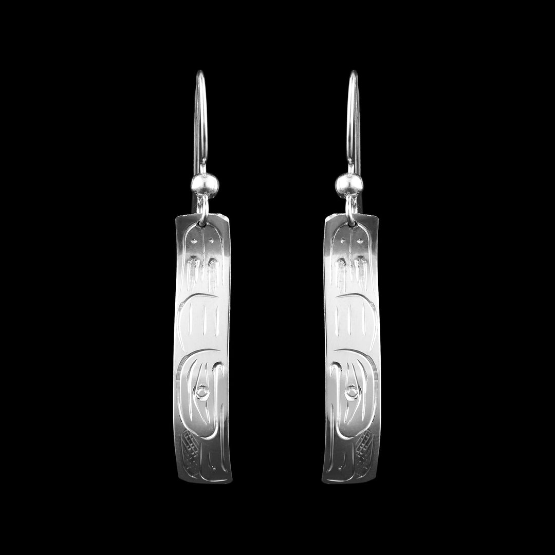 Sterling Silver Eagle Wavy Earrings. These rectangular drop earrings have the indigenous carvings of the Eagle legend.