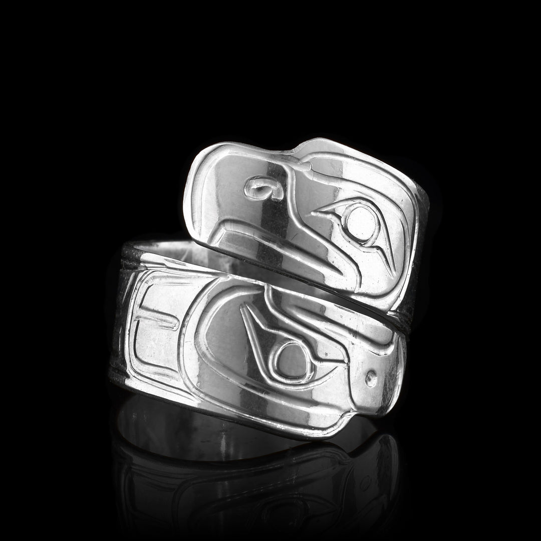 Eagle wrap ring hand-carved by Kwakwaka'wakw artist Norman Seaweed. Made of sterling silver. 