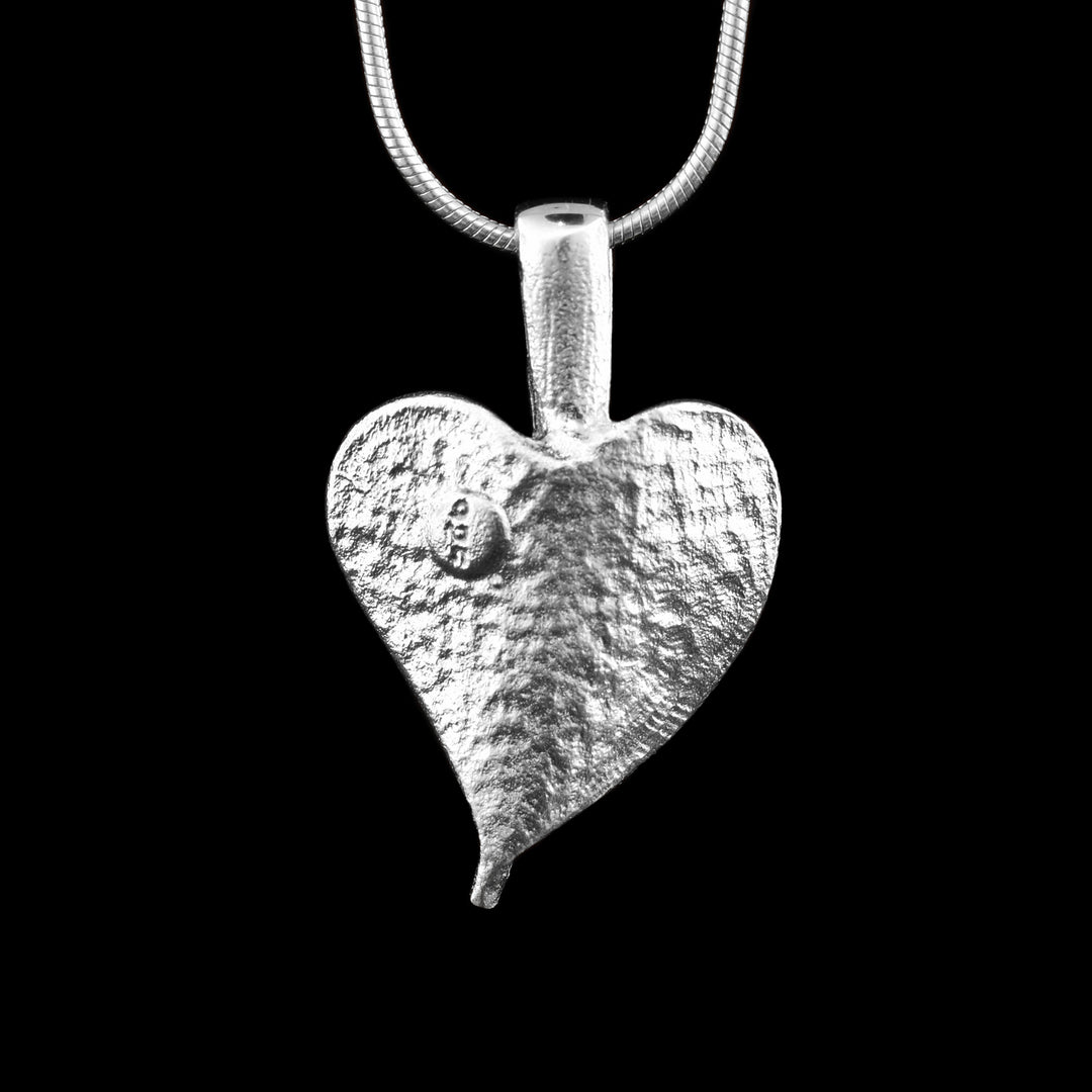 Sterling Silver Heart Necklace is carefully crafted with textured sterling silver in the shape of a heart.