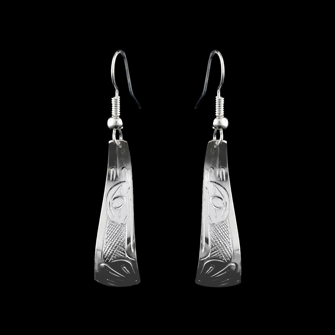 These beautiful dangle earrings are Hand carved with the legend of the hummingbird and made from solid sterling silver.