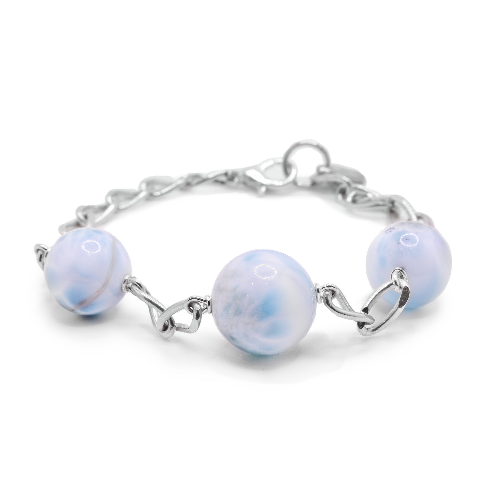 This Sterling Silver Larimar Chain Bracelet has 3 beads of larimar connected by a silver chain.