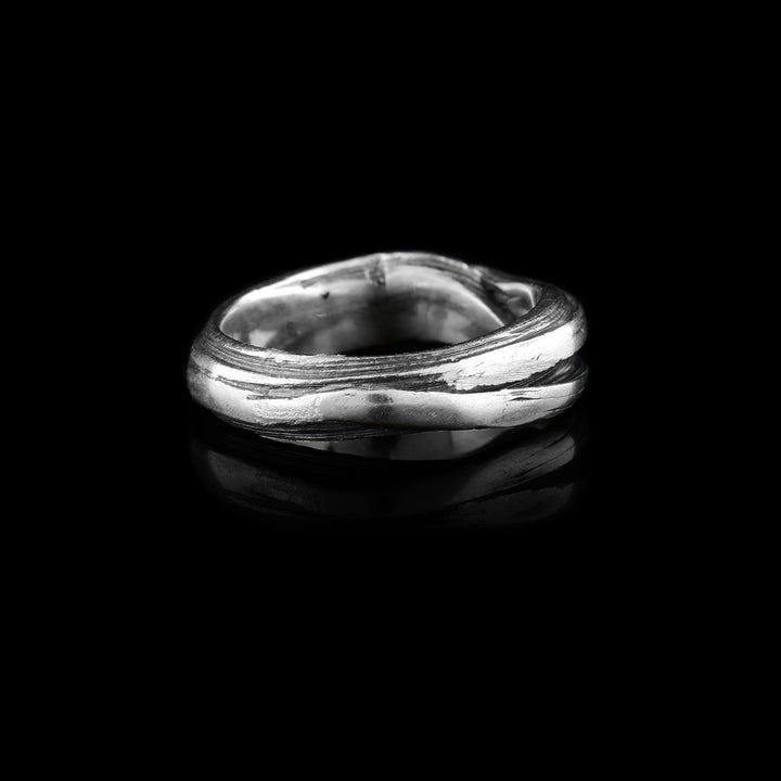 This piece is created using Mitsuro Hikime, a rare and traditional Japanese wax technique. Lisa-Marie hand-sculpts a specially formulated "honey wax" into these unique, ribbed textures. Because the wax is pulled and folded by hand, the resulting silver form possesses a rhythmic, liquid-like quality that is impossible to replicate with modern machinery.