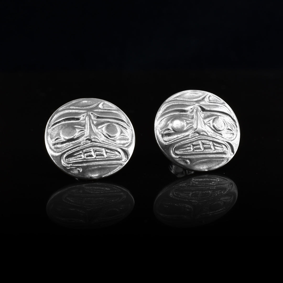 These circular Sterling Silver Moon Studs have been hand-carved with the legend of the moon carved into the surface
