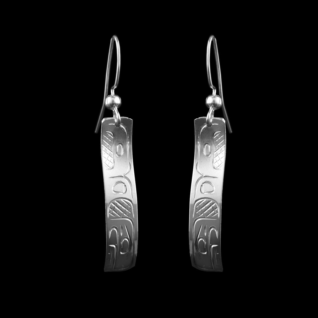 Sterling Silver Orca Drop Earrings, carved with the indigenous legend of the Orca down the rectangular drop earring.