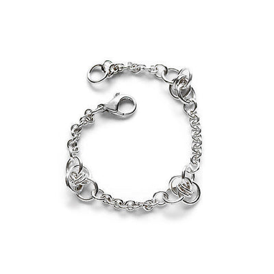 This sterling silver chain bracelet has clusters of chain links that are woven together to resemble bumblebees. There are three "bees" on this otherwise ordinary chain.