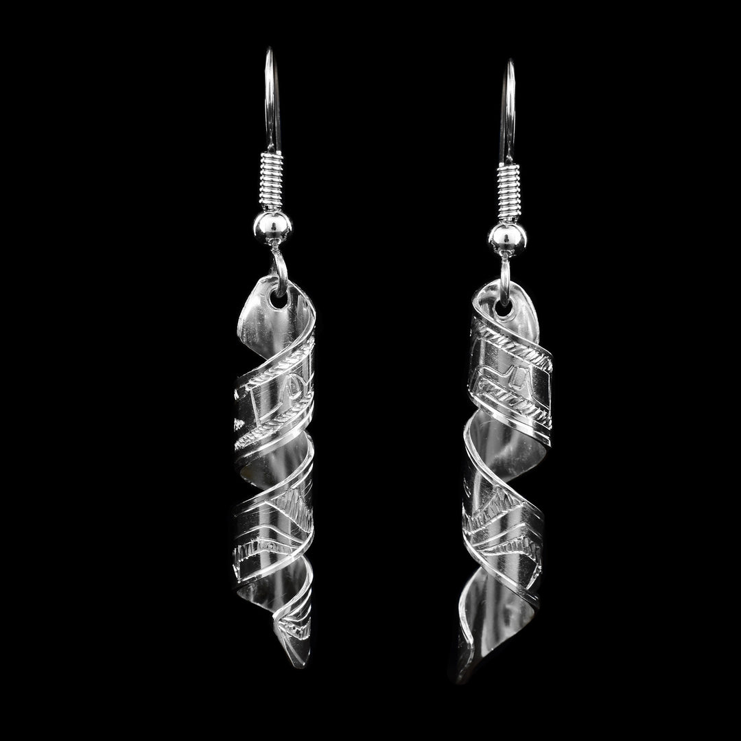These sterling silver dangle earrings have spiral hangs with depictions of the Raven carved into them.