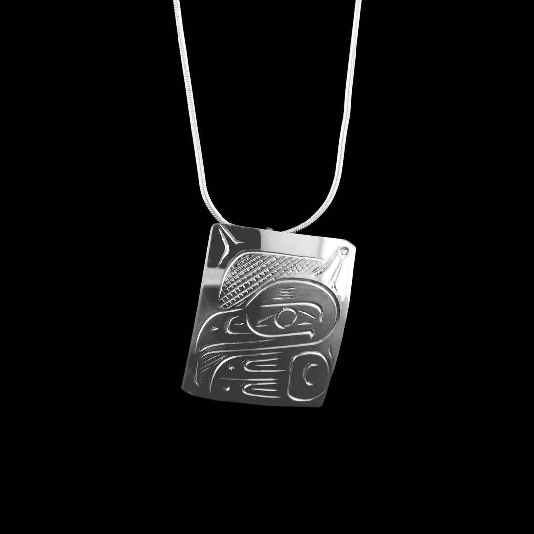 This Sterling Silver Rectangle Eagle Pendant has been carved with the indigenous legend for power and intelligence.