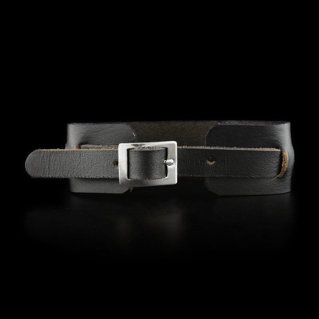 Back of leather cuff showing adjustable buckle.