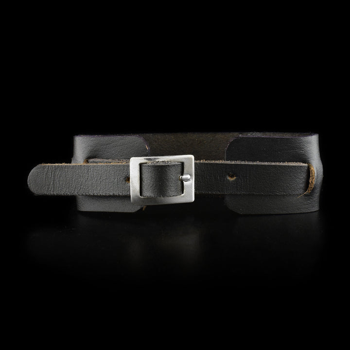 Back of leather cuff showing adjustable buckle.