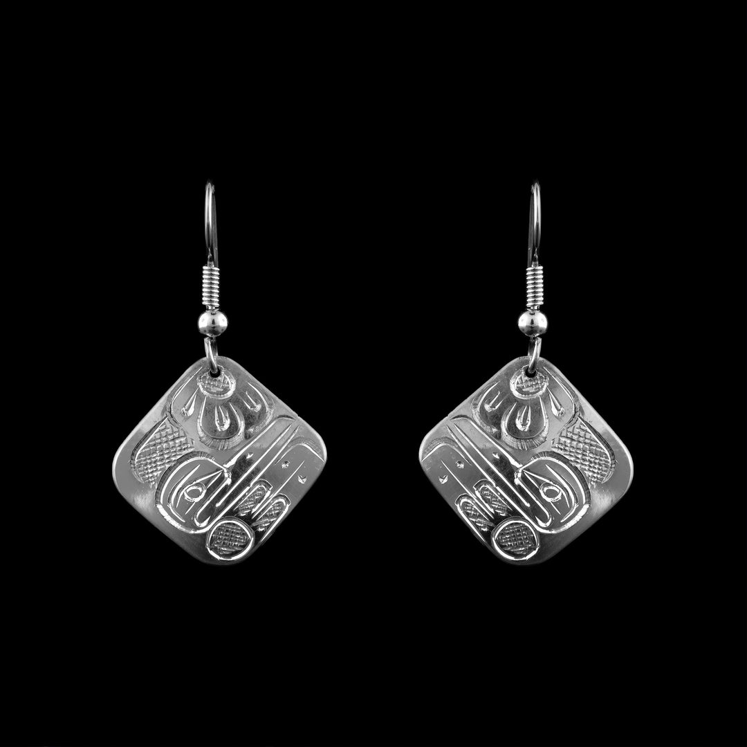 Coast Salish artistry. These sterling silver square earrings by Graham Henry elegantly depict the Hummingbird legend through hand-carved detail.