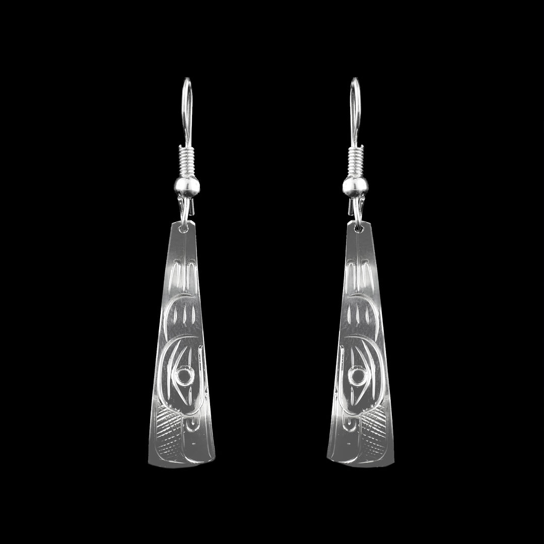 These sterling silver Triangle dangle earrings have been hand carved with the legend of the Eagle on the surface.