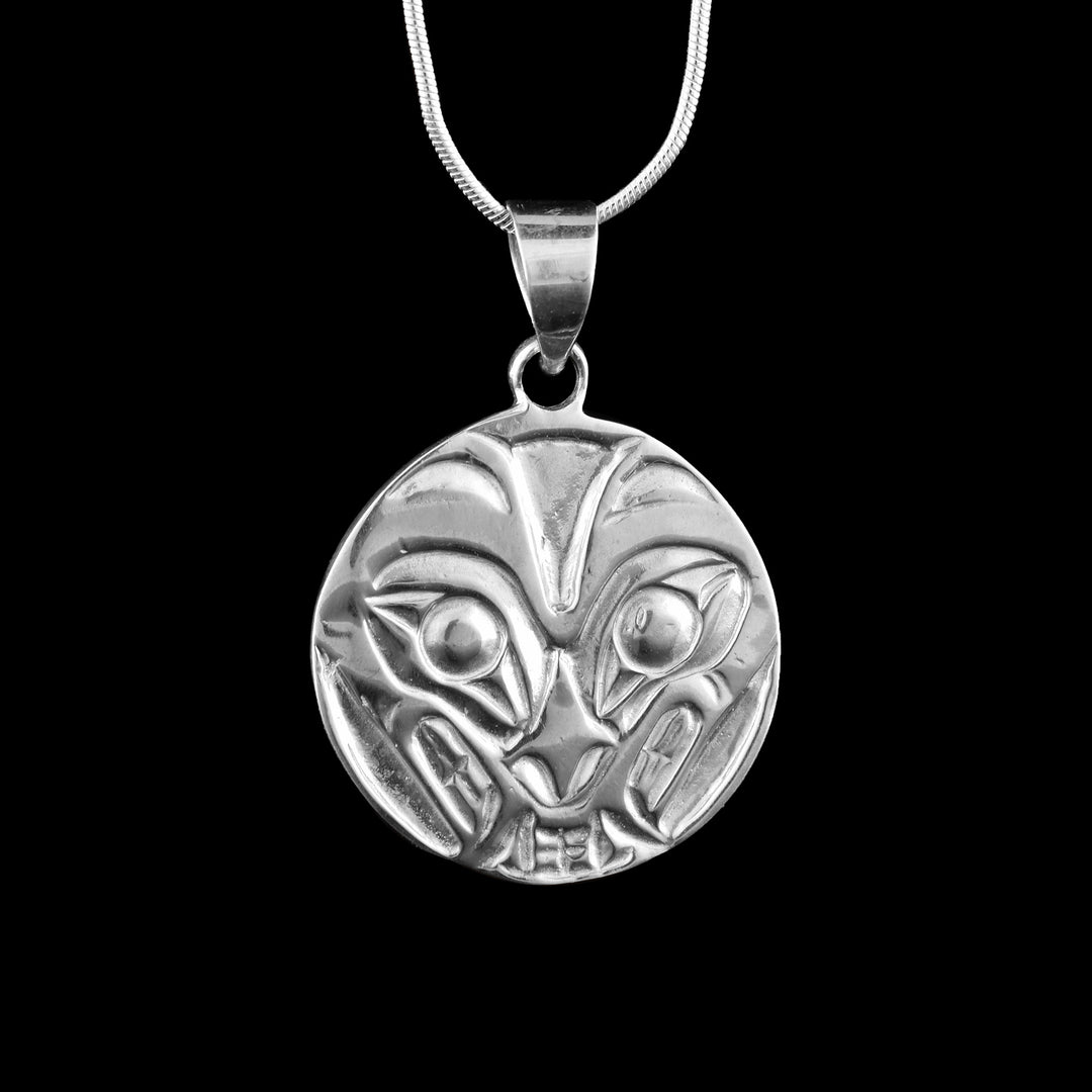 With a diameter of 3/4" this Sterling Silver Wolf Circle Pendant showcase the legend of the wolf.