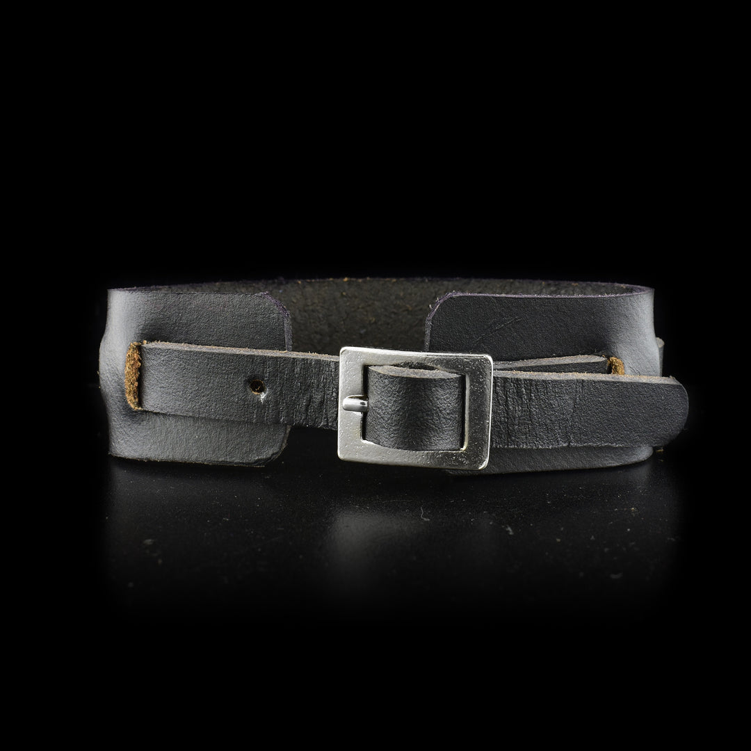 Back of leather cuff showing adjustable buckle.