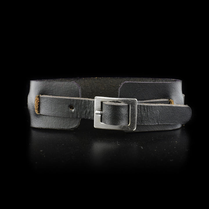 Back of leather cuff showing adjustable buckle.