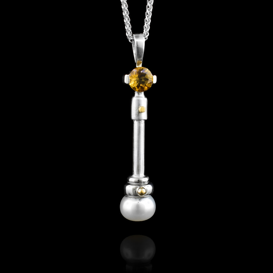 Sterling Silver post with 14k Gold screws the Pendant is accented with  with a pearl on the bottom and Citrine gem stone on the top.