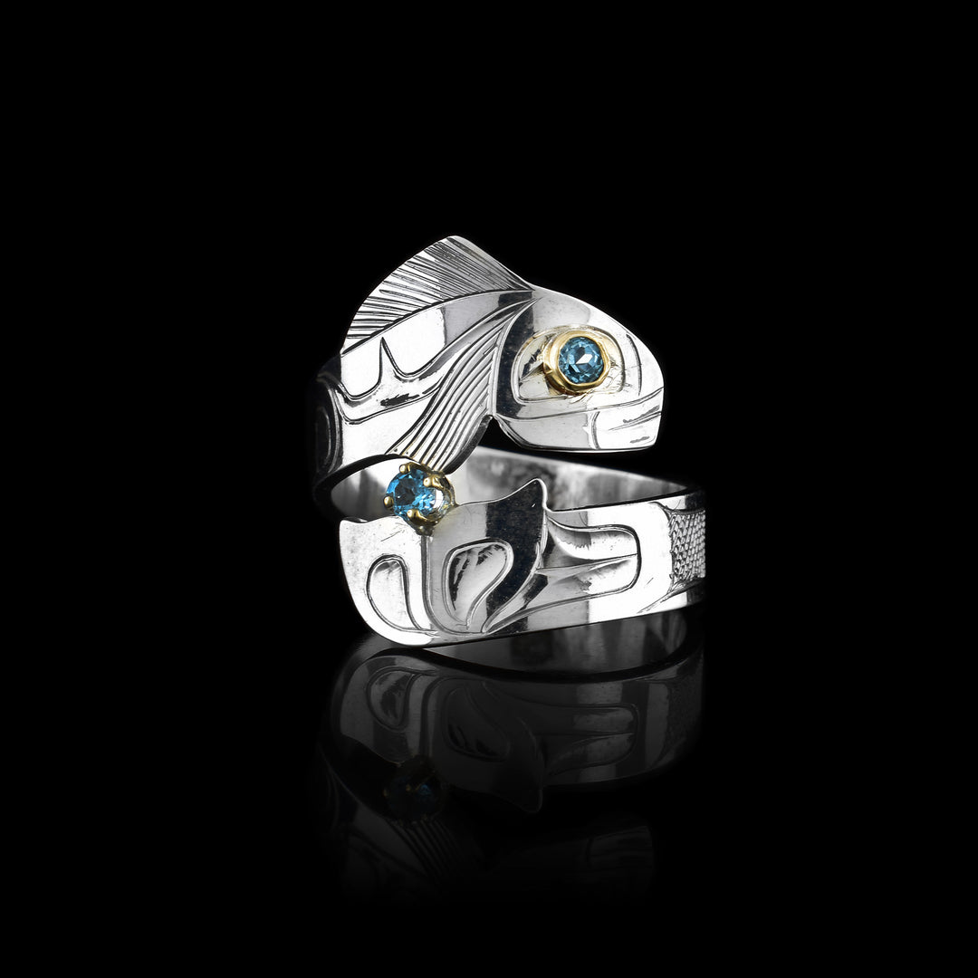 Sterling Silver and Gold Salmon Wrap Ring with blue gemstones fir the eye and tip of the tail.