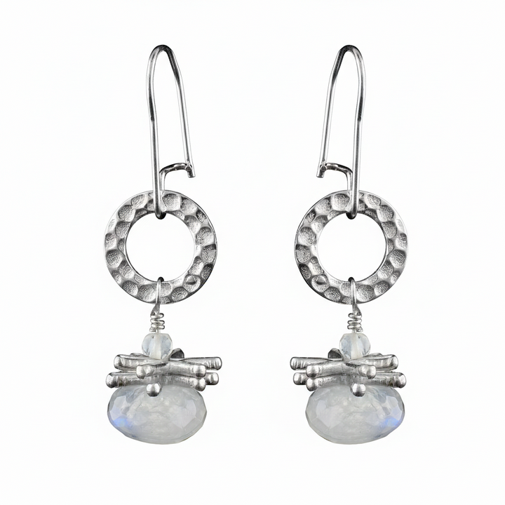 Sterling Silver circles and Moonstone hang from them to make beautiful Earrings