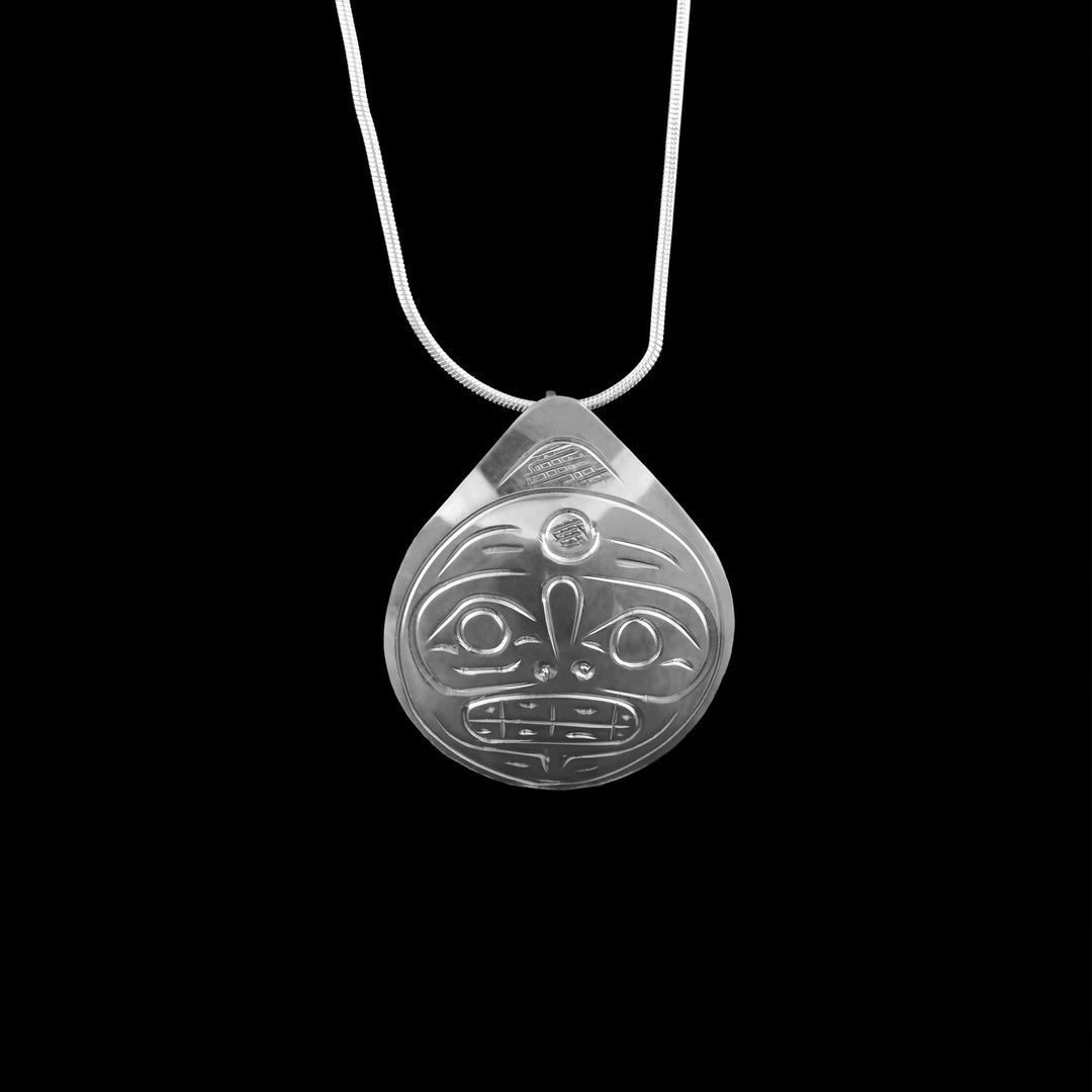 This teardrop Sterling Silver Moon pendant has been crafted with indigenous legend of the moon. 