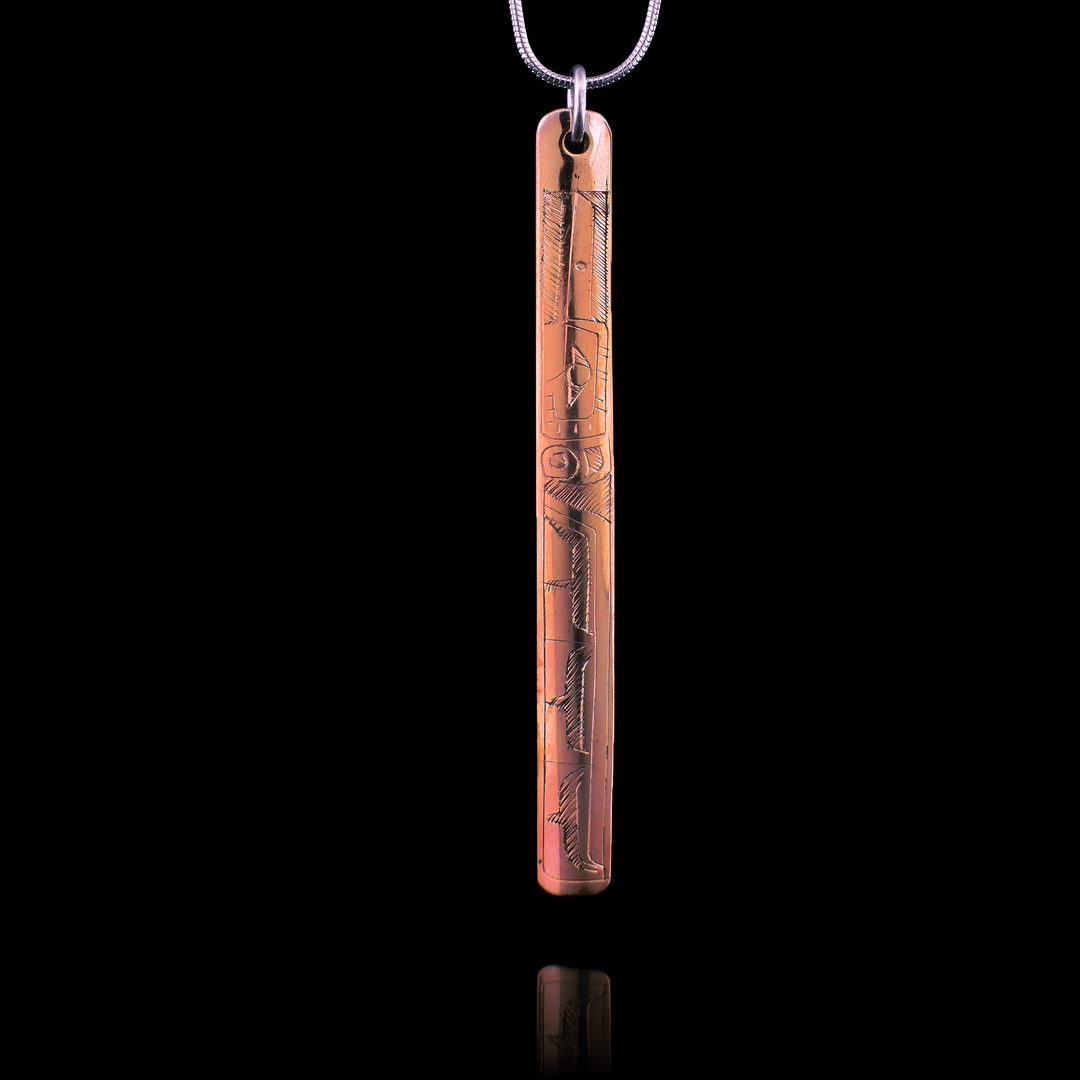 this thin rectangular copper Hummingbird pendant is hand carved with the legend of the indigenous meaning of the Hummingbird.