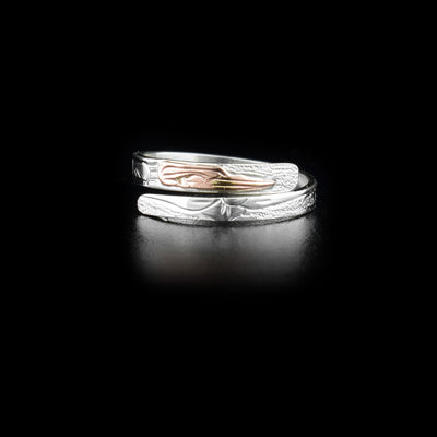 Sterling silver wrap ring with 14K rose gold hummingbird head. 0.13” wide band. Hand-carved by Kwakwaka’wakw artist Victoria Harper.