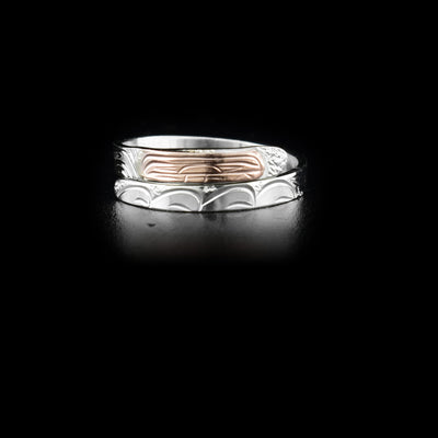 Sterling silver wrap ring with 14K rose gold orca head. 0.13” wide band. Hand-carved by Kwakwaka’wakw artist Victoria Harper.