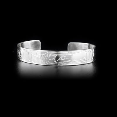Sterling silver cuff bracelet featuring wolf.
