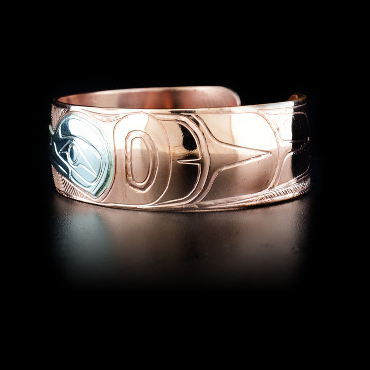 Left side of bracelet with more carved designs.