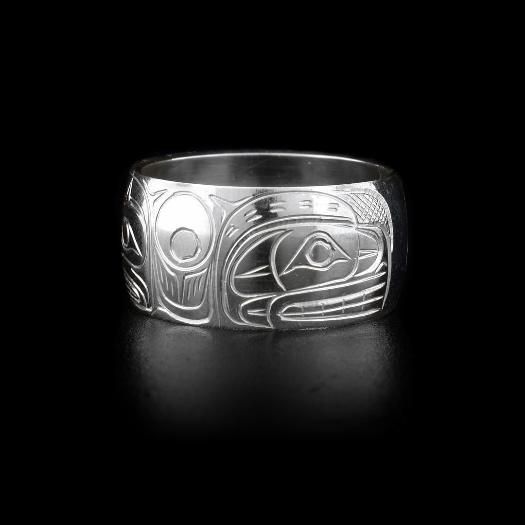 This heavy gauge Bear ring is made from sterling silver and has two depictions of the Bear carved into the surface of the band.