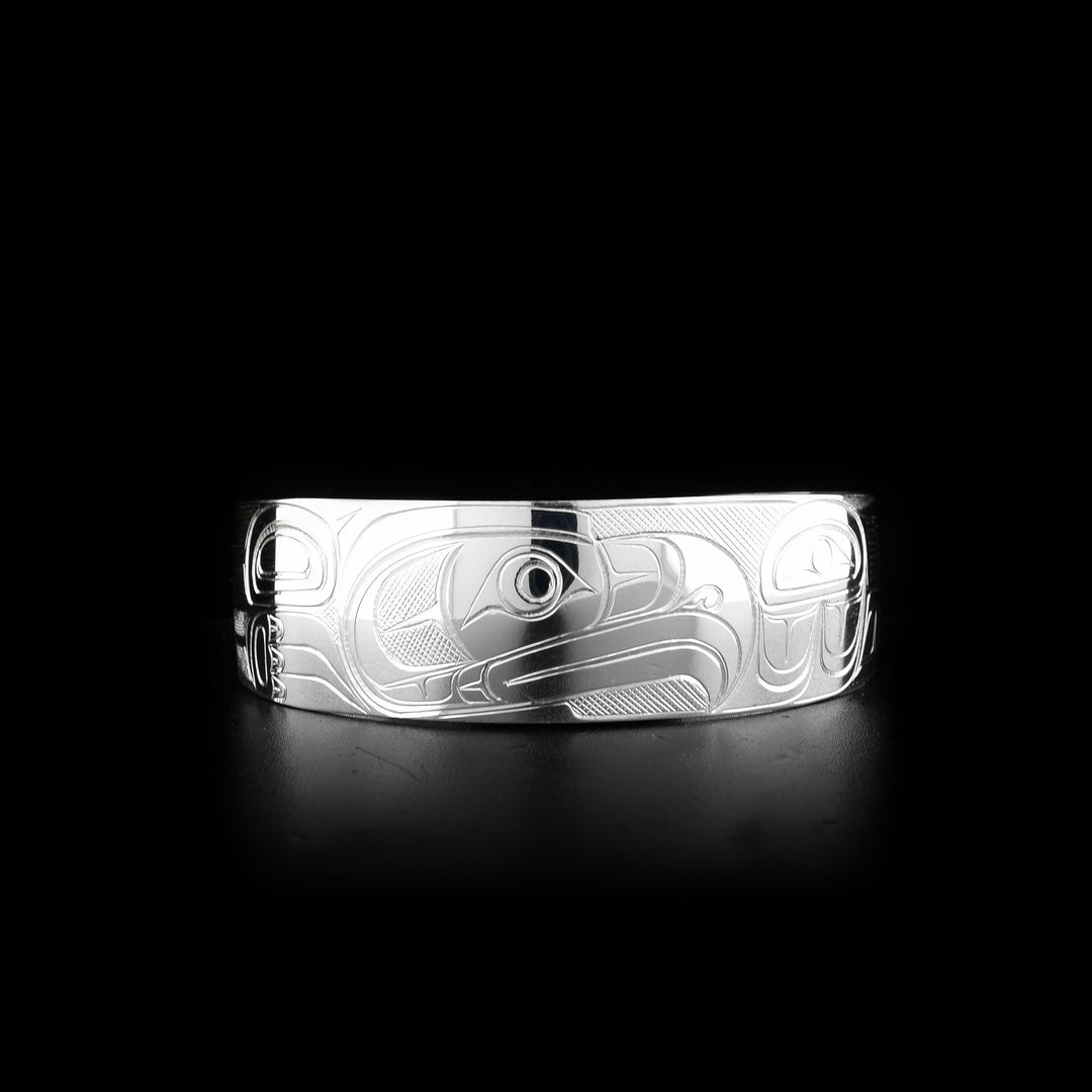 This Eagle bracelet is made from sterling silver and there is a depiction of the Eagle carved into the surface of it.