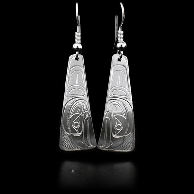 These sterling silver Eagle earrings have long, thin hangs that curve in slightly at the end. They have Eagles carved into them.