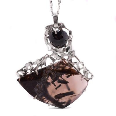 Abstract sterling silver Turkish agate and moissanite pendant necklace.