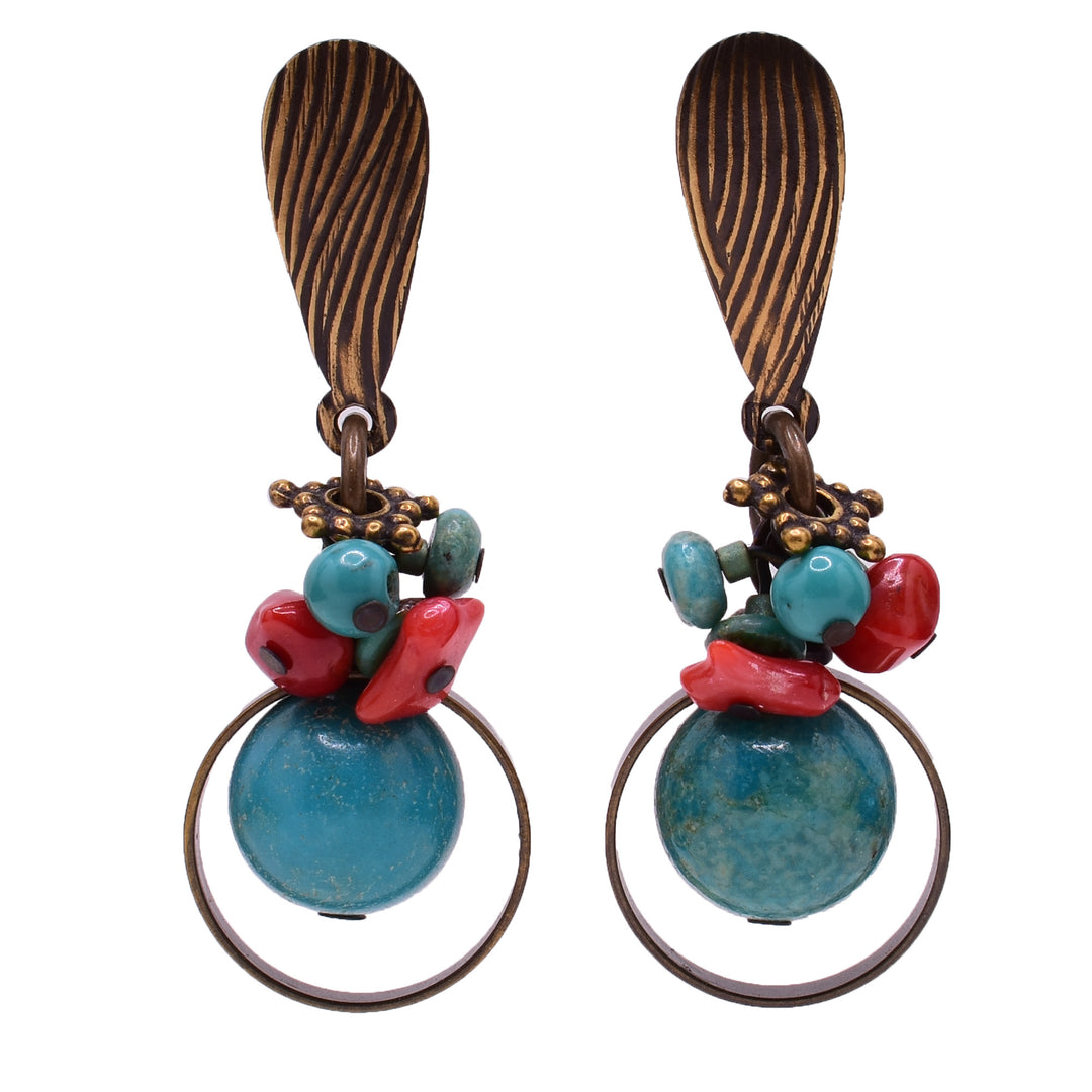Dangle stud earrings made of coral, turquoise and brass. Titanium ear posts. By Honica.