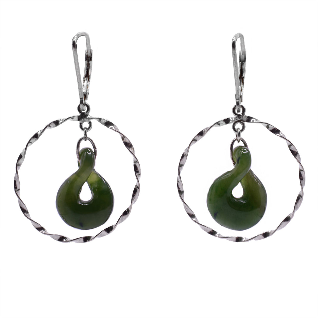 These leverback earrings feature a round, textured twisted silver frame. This twisted wire circle perfectly encloses a matching twisted piece of BC jade.