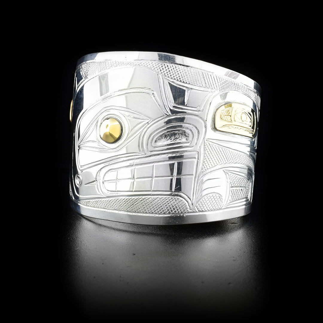 Two inch sterling silver and 14K yellow gold bear cuff with tapered ends.