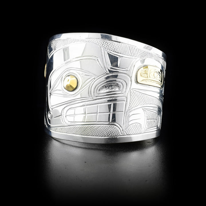 Two inch sterling silver and 14K yellow gold bear cuff with tapered ends.