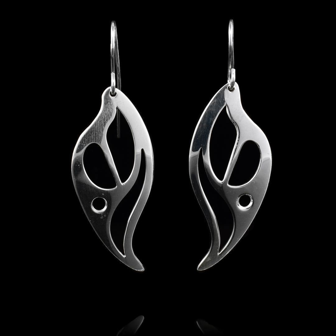 These sterling silver dangle earrings have hangs that are shaped like and have several cutouts that depict flames.