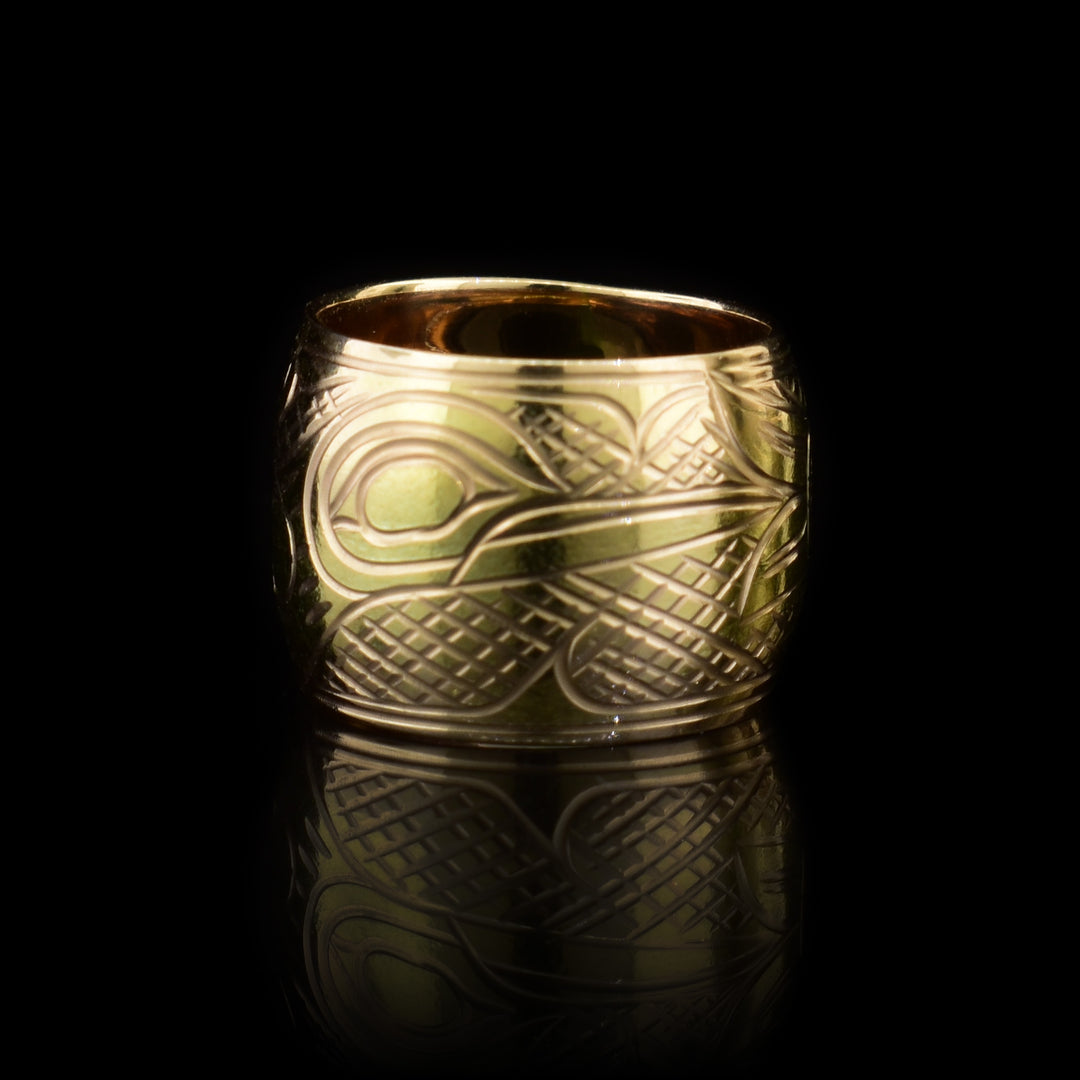 This Hummingbird charm spirit bead is made from solid 14K gold and has carvings across the surface of it depicting the Hummingbird.