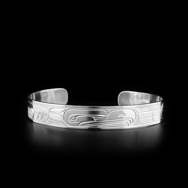This Eagle bracelet is made from sterling silver and is a cuff bracelet. There is a depiction of the Eagle carved into the surface of the band.
