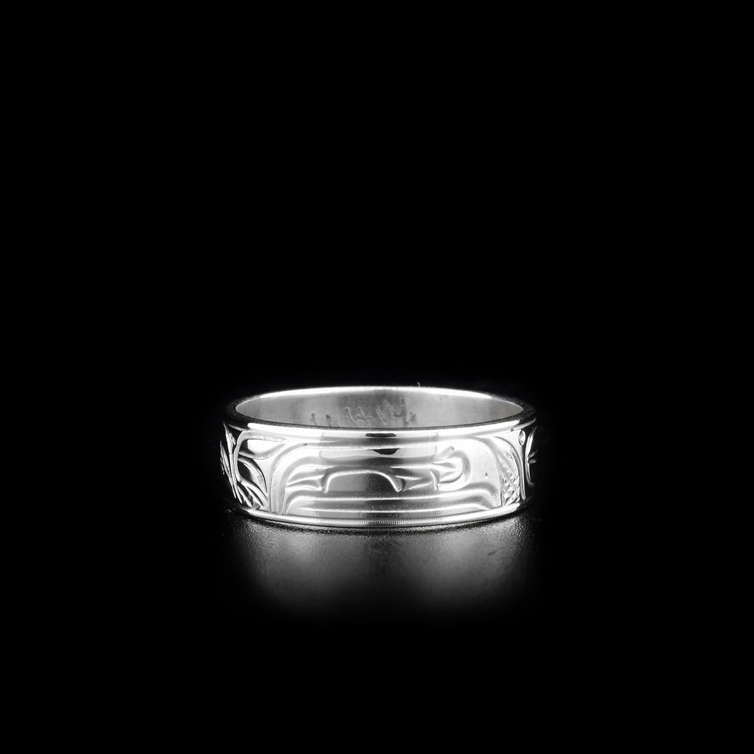 This Raven ring is made from sterling silver and there is a depiction of the Raven carved into the surface of the band.