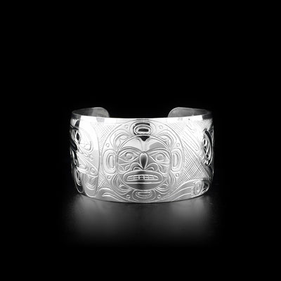 Front of bracelet features moon. 1.25” wide. Hand-carved by Kwakwaka’wakw artist Don Lancaster.