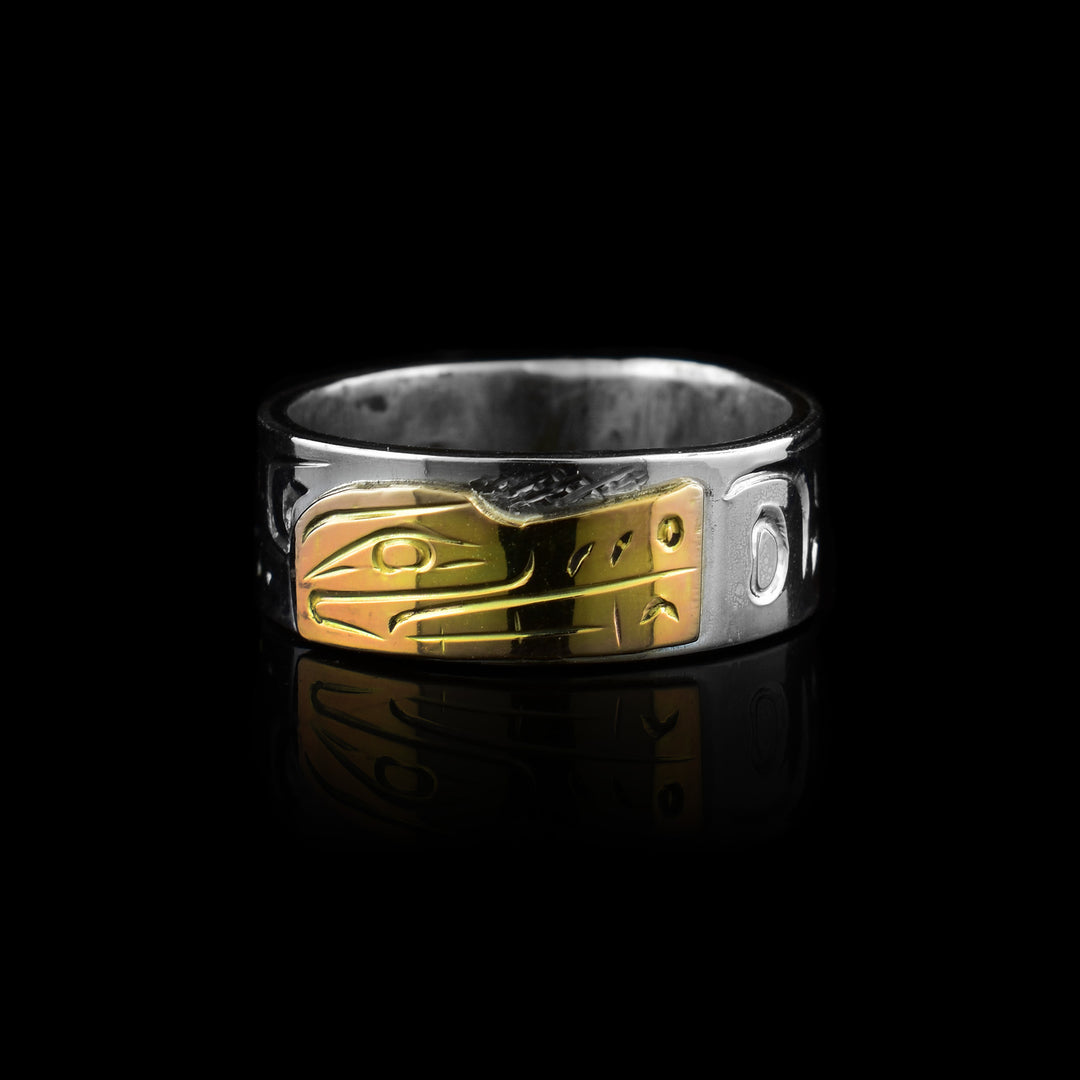 Wolf legend band ring by Graham Henry. Hand-carved sterling silver with a striking 10k gold inlay and traditional motifs.