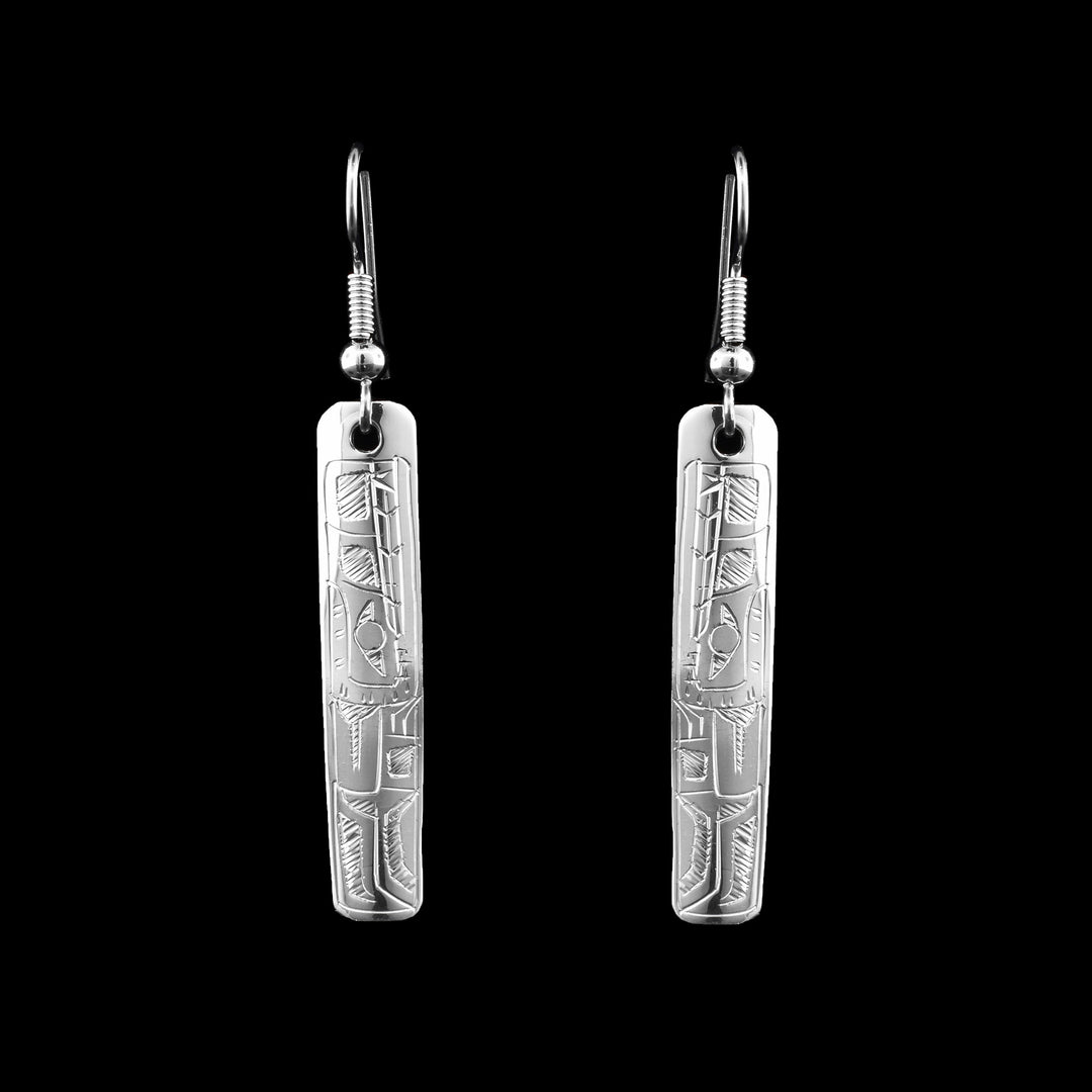 Wolf Dangle Earrings, made with sterling silver and dangle in a rectangle form.