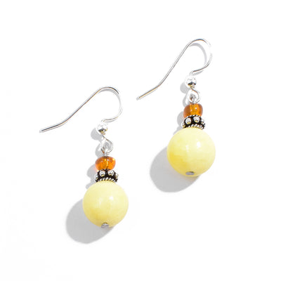 Sterling silver yellow quartzite and orange glass dangle earrings.