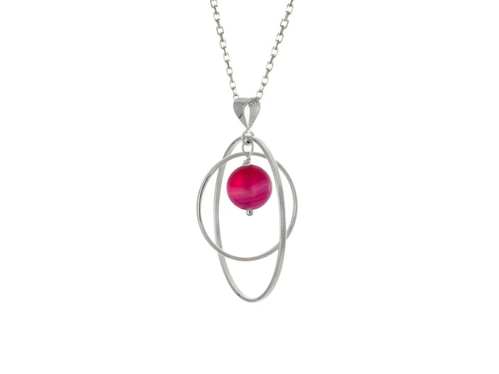 This pink agate necklace has a large sterling silver hoop with a smaller hoop in the middle of it and a sphere shaped pink agate bead in the center of them. All of these pieces are suspended and can orbit around each other.
