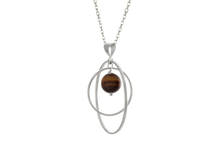 This tiger's eye necklace has a large sterling silver hoop with a smaller hoop in the middle of it and a sphere shaped tiger's eye bead in the center of them. All of these pieces are suspended and can orbit around each other.